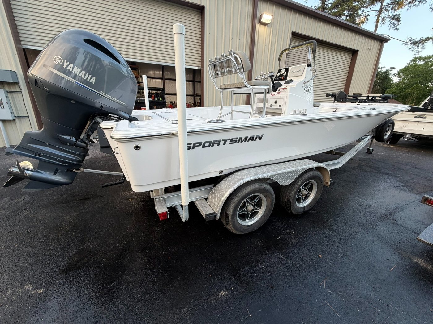 Boat on McClain tandem axle aluminum trailer