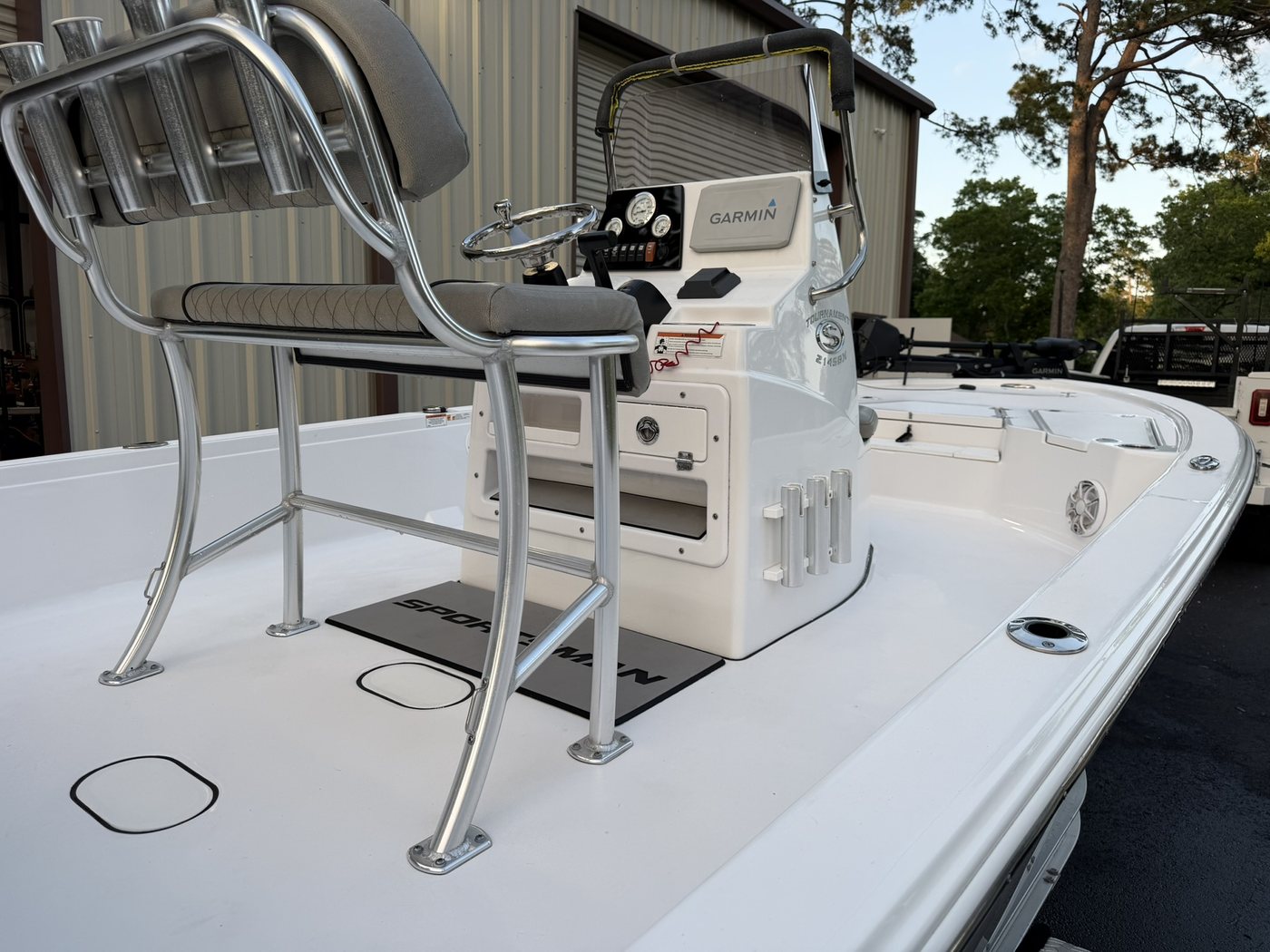Helm with steering and Garmin display
